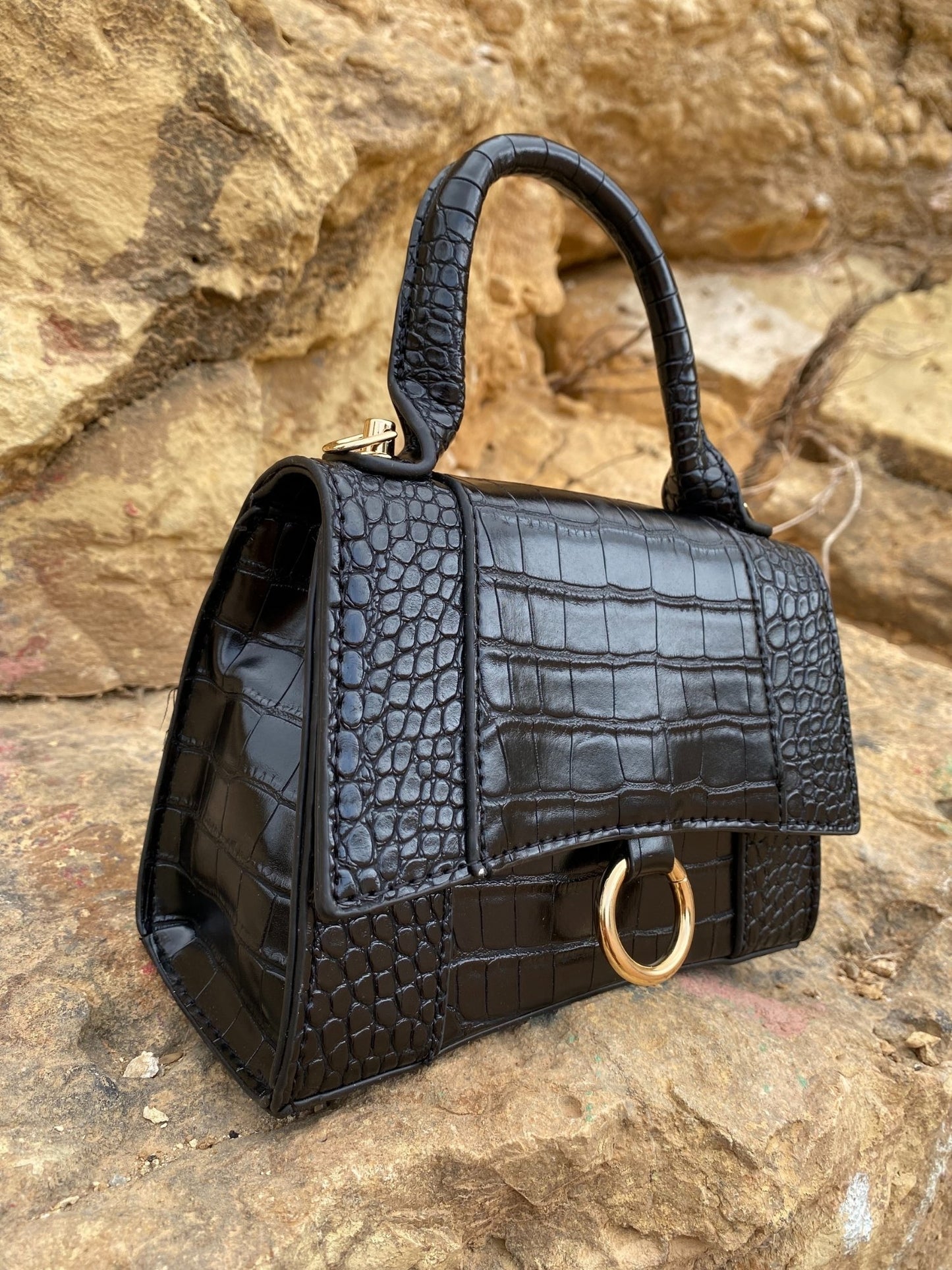 Skuldertaske med dyreprint og spænde